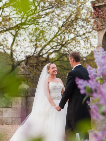 bride and groom have a moment together at their victorian stately home wedding