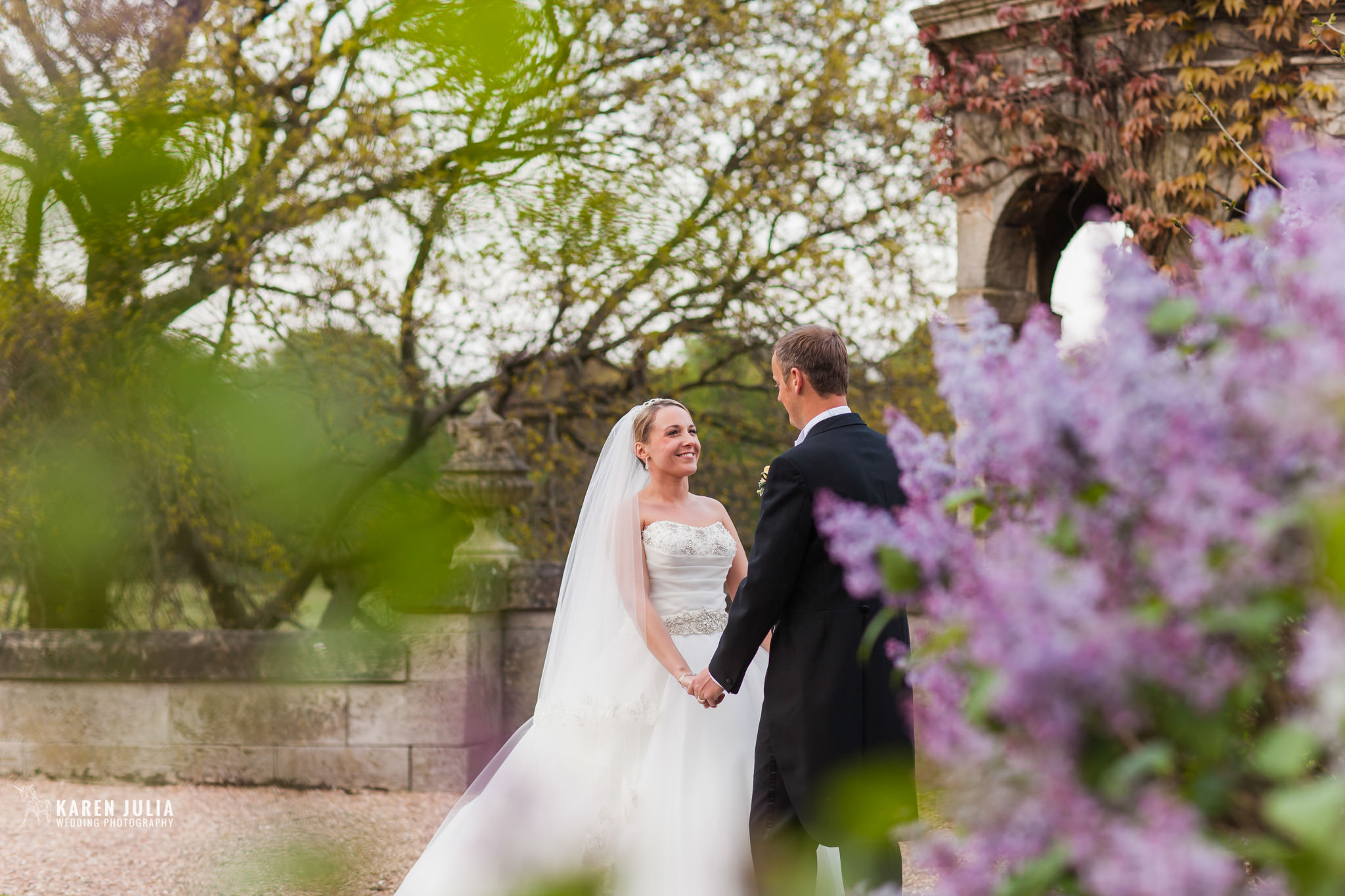 bride and groom have a moment together at their victorian stately home wedding