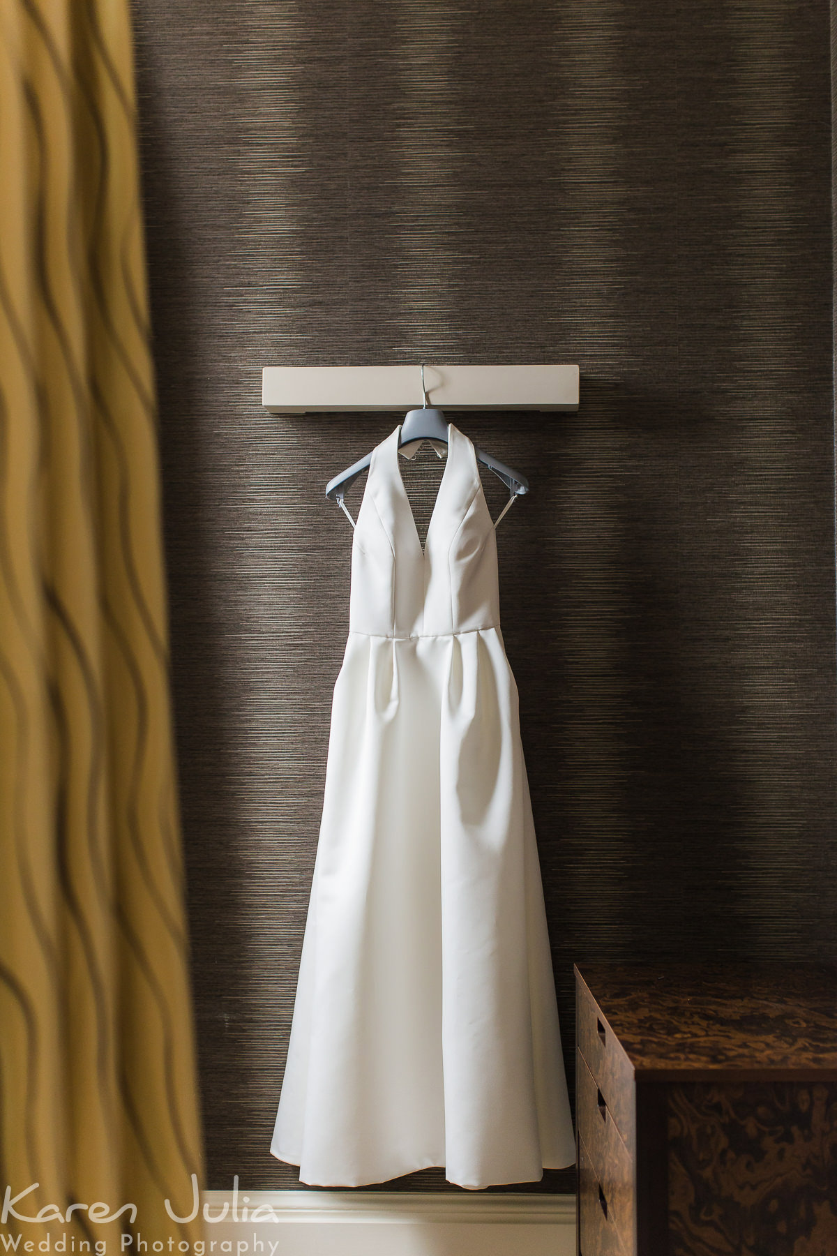 brides dress hung up in Manchester Midland hotel