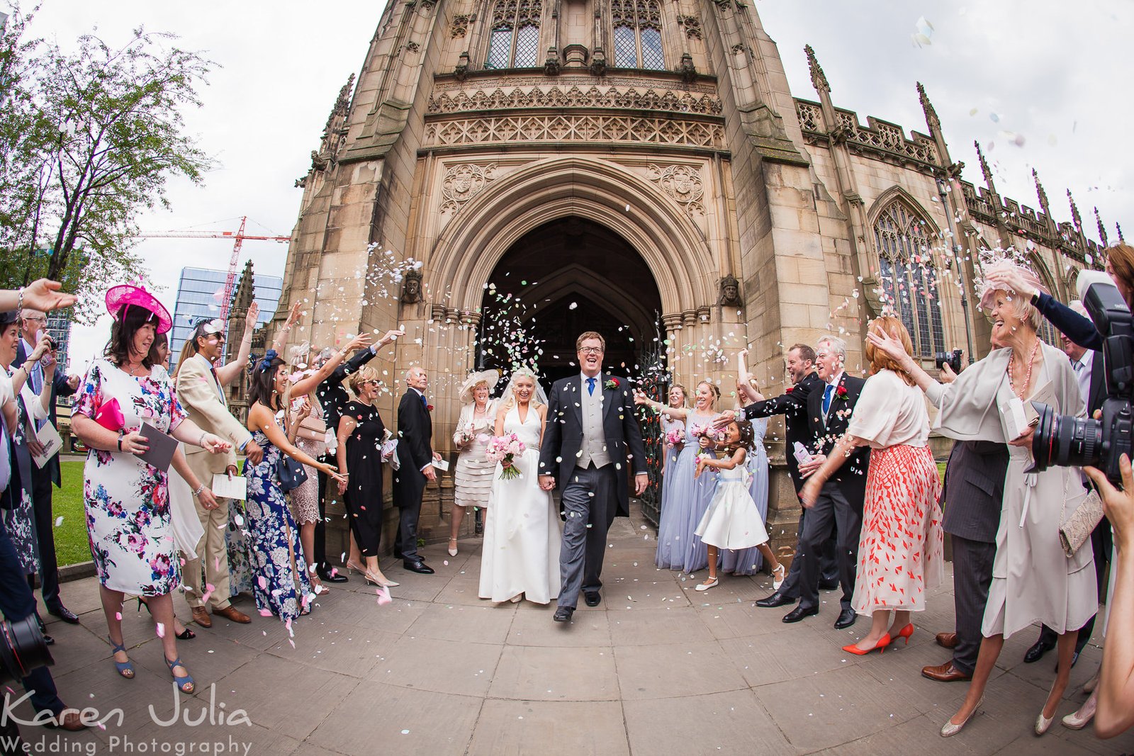 confetti photo outside Manchester Cathedral