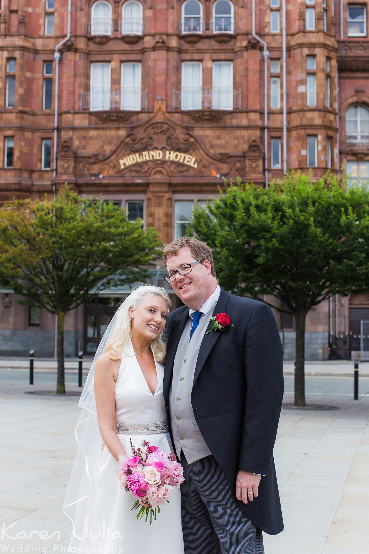 bride and groom portrait outside Manchester Midland hotel