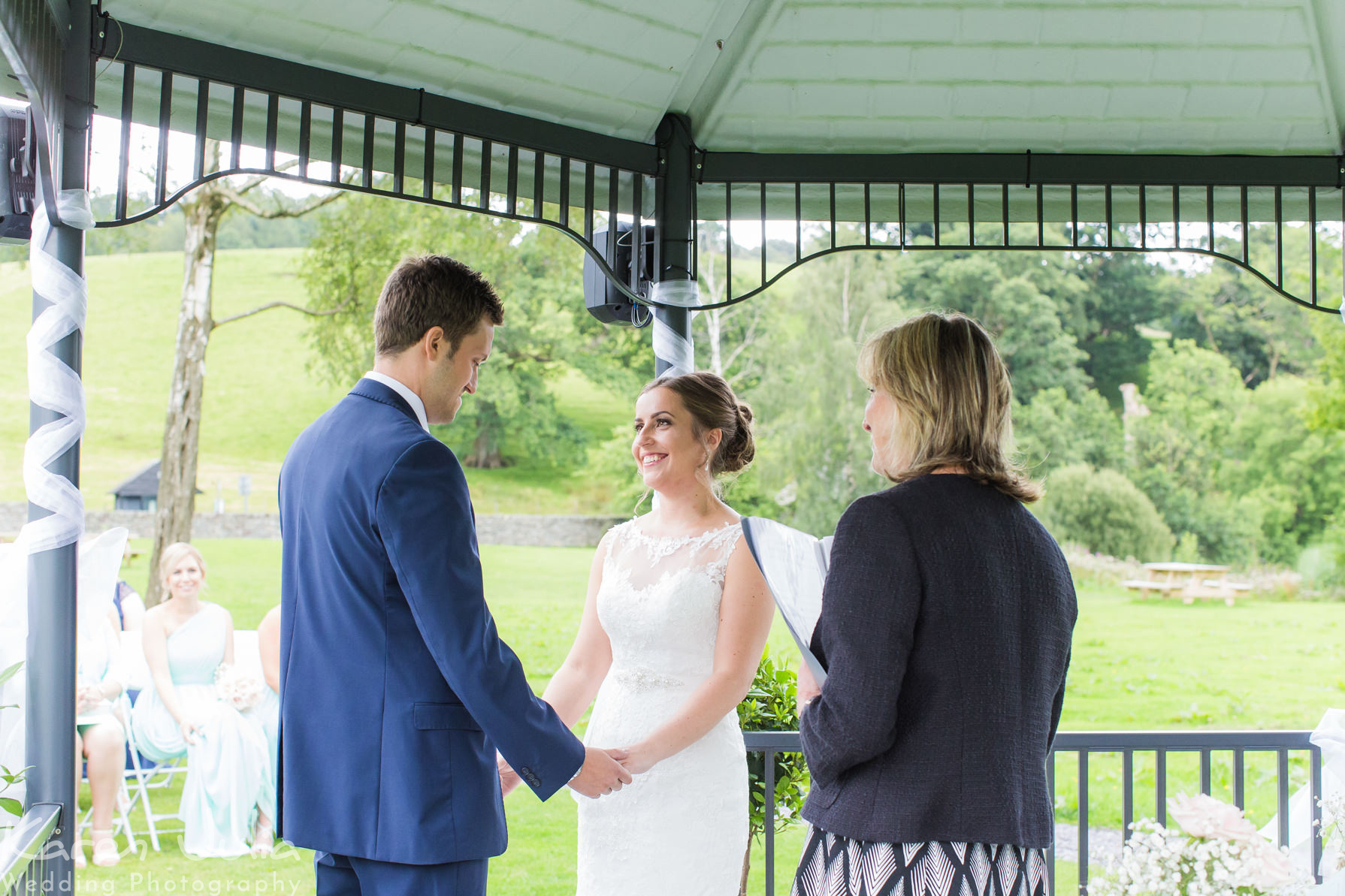 bride and groom exchange vows at their Daffodil Hotel & Spa Wedding ceremony