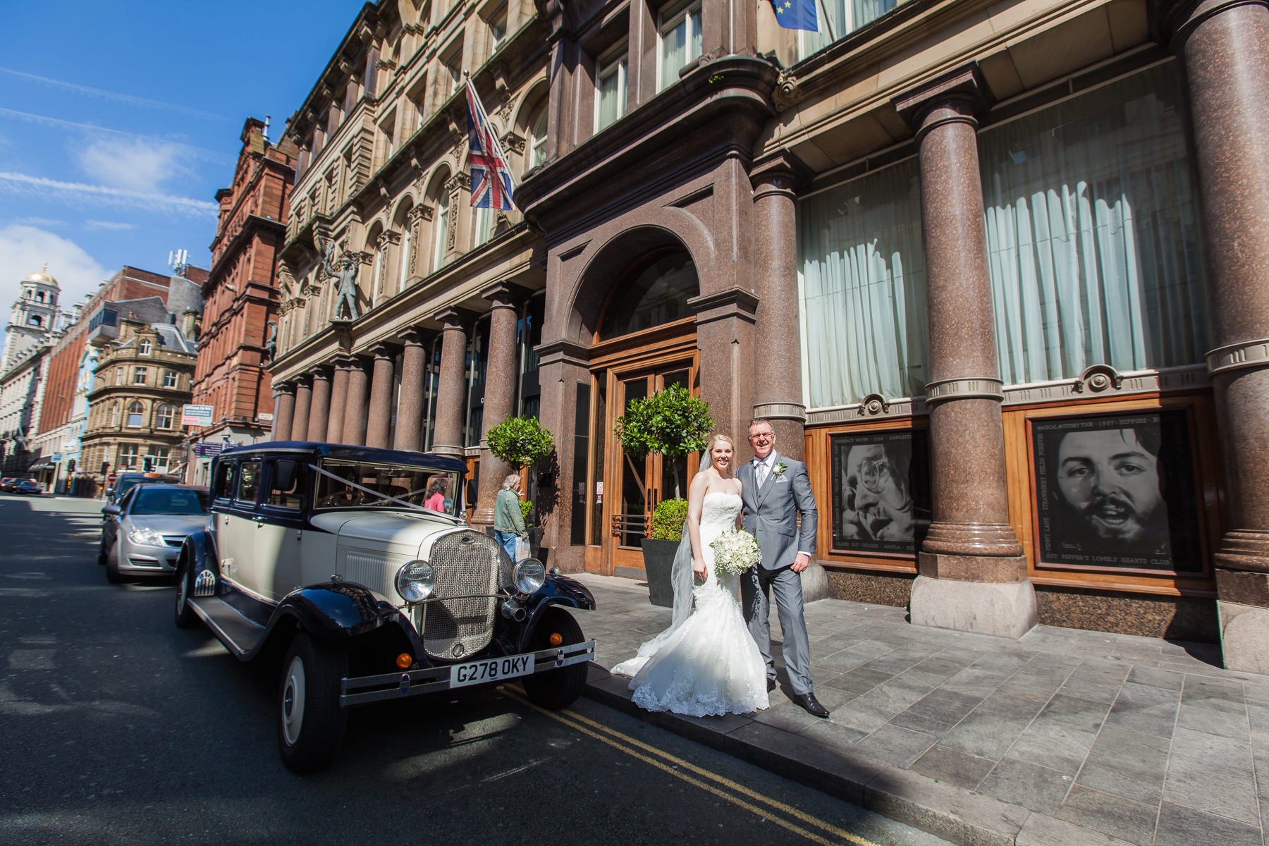 bride with Dad arriving outside the Hard Days Night Hotel on her wedding day