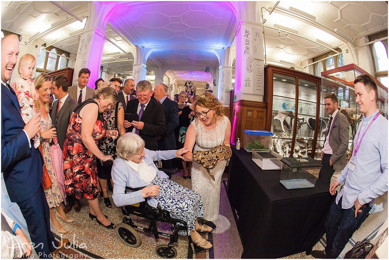 guests hold animals during an animal display at Manchester Museum