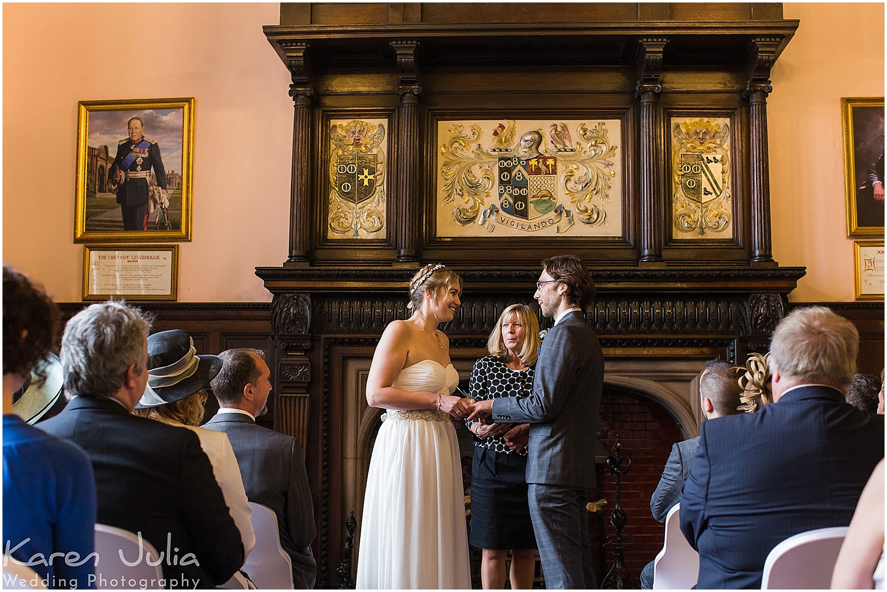Reaseheath Hall wedding ceremony with bride and groom exchanging rings