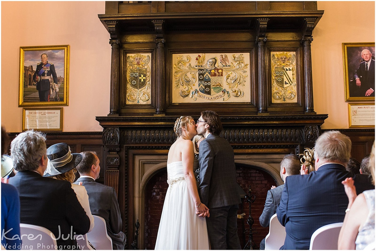 bride and groom kiss at Reaseheath Hall wedding ceremony