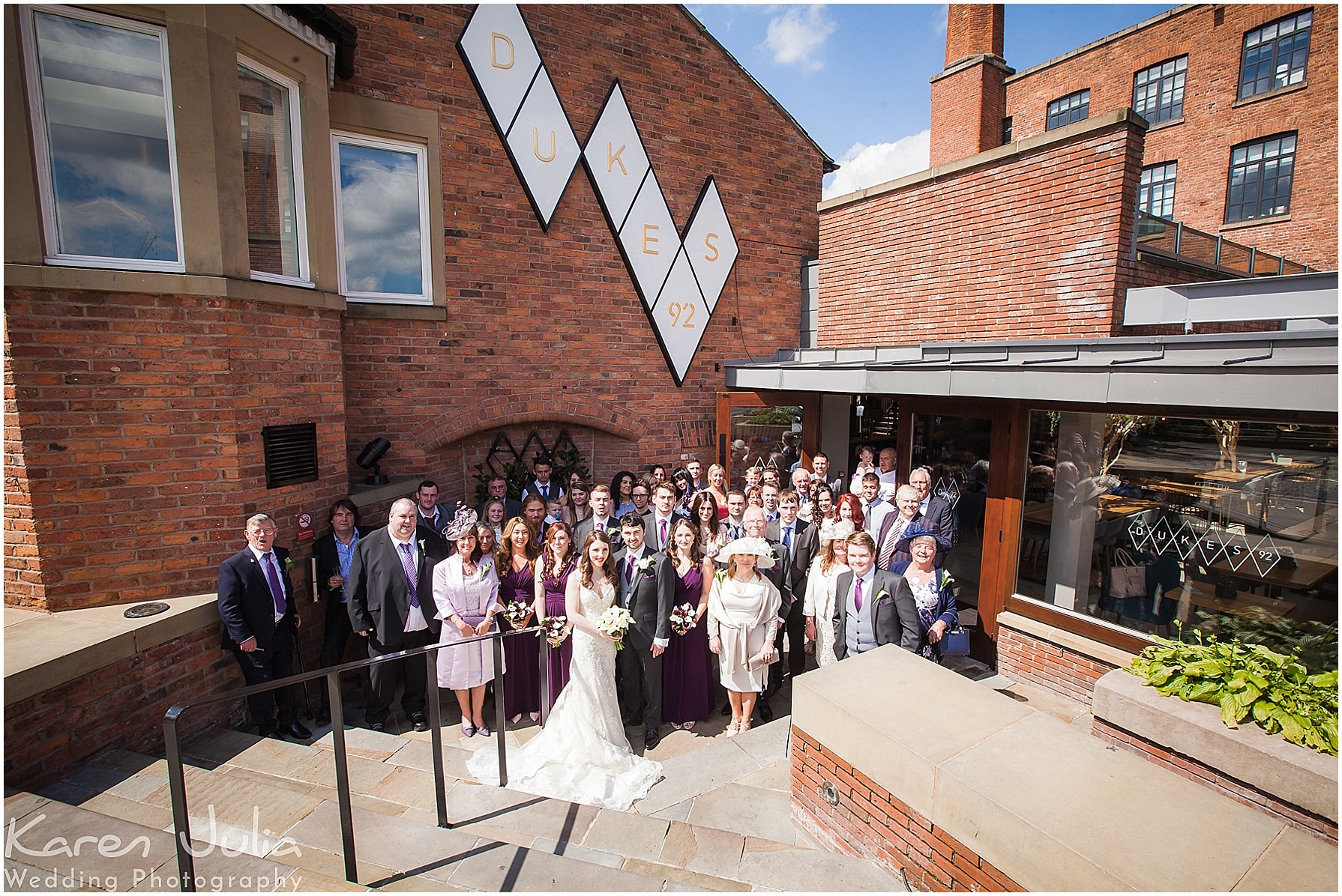 wedding group photo outside Castlefield Rooms Dukes 92