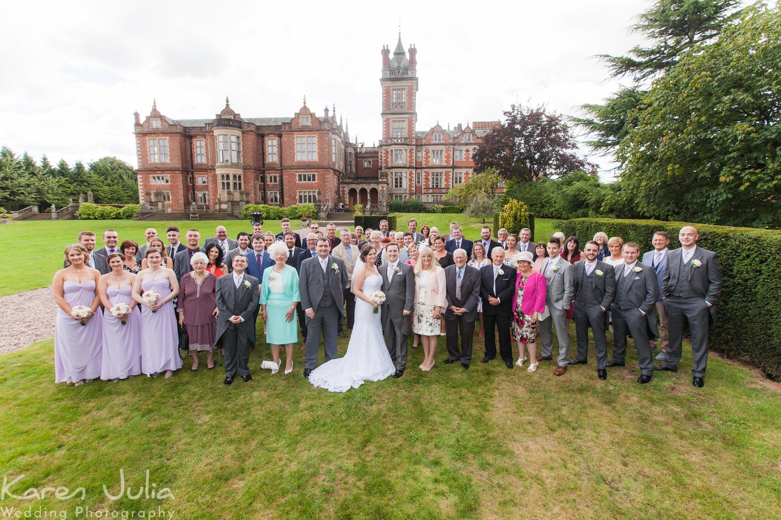 Crewe Hall wedding photography group photo on the lawn