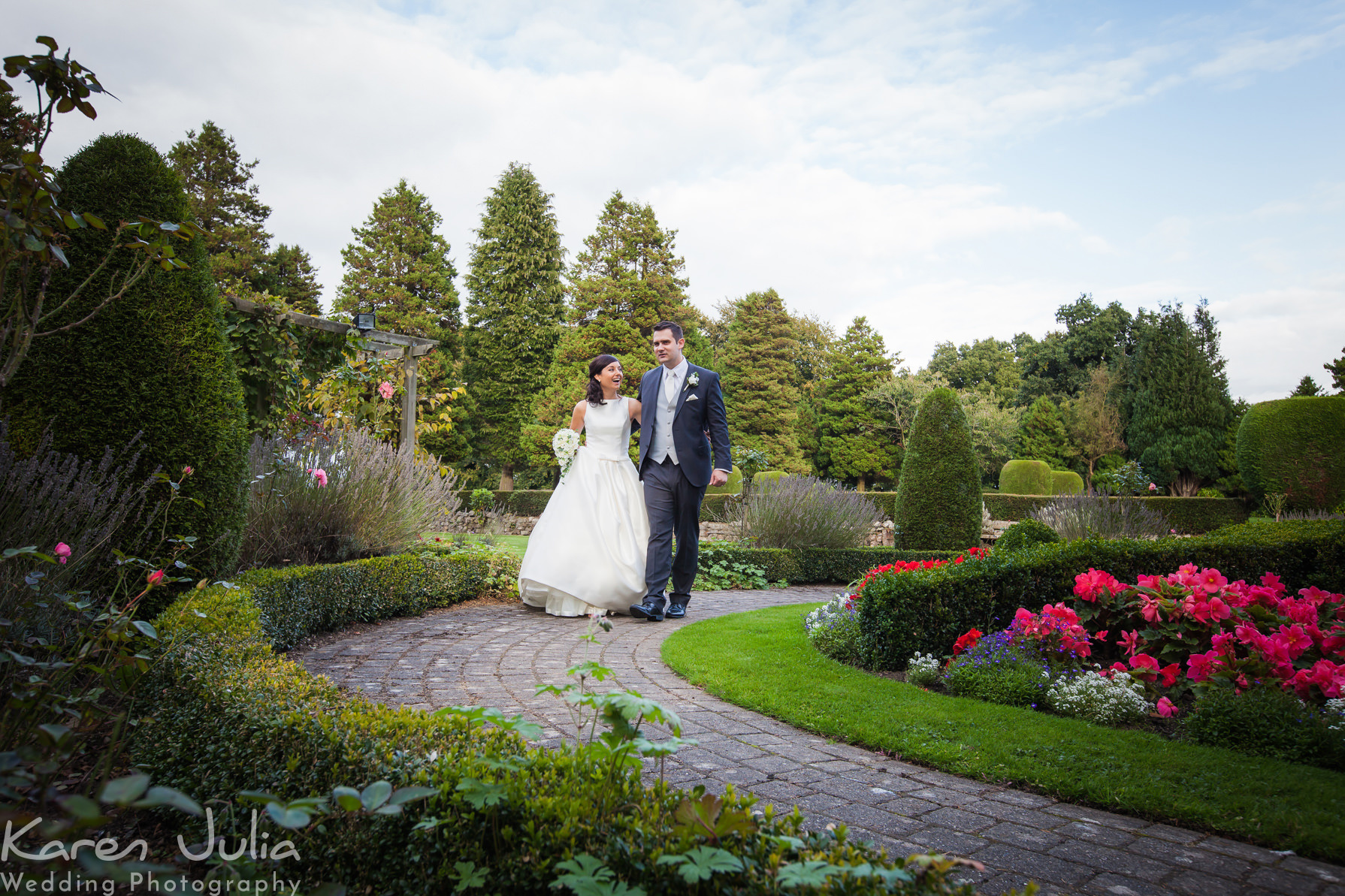 Mottram Hall wedding photography of bride and groom in gardens