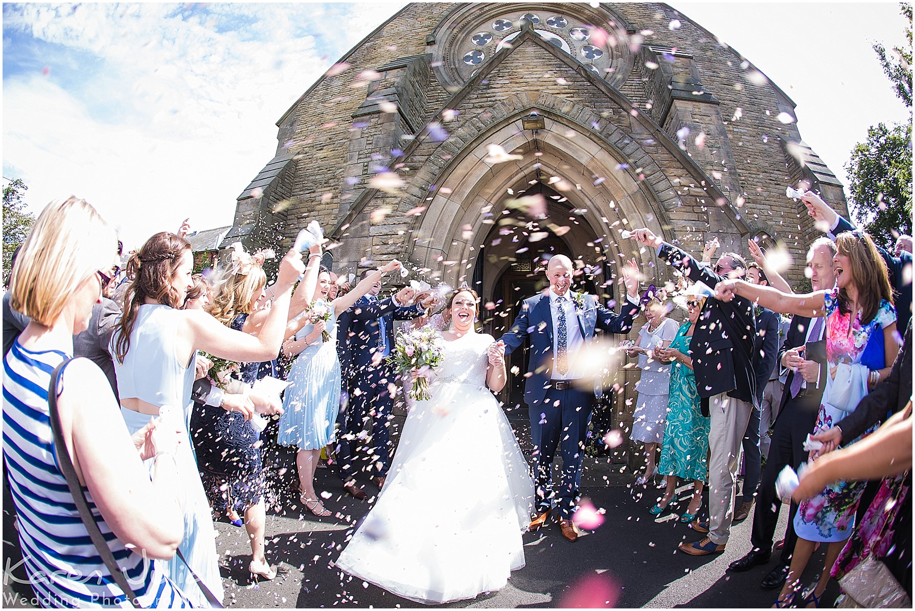 bride and groom confetti photo outside St Matthews church, Little Lever, Bolton