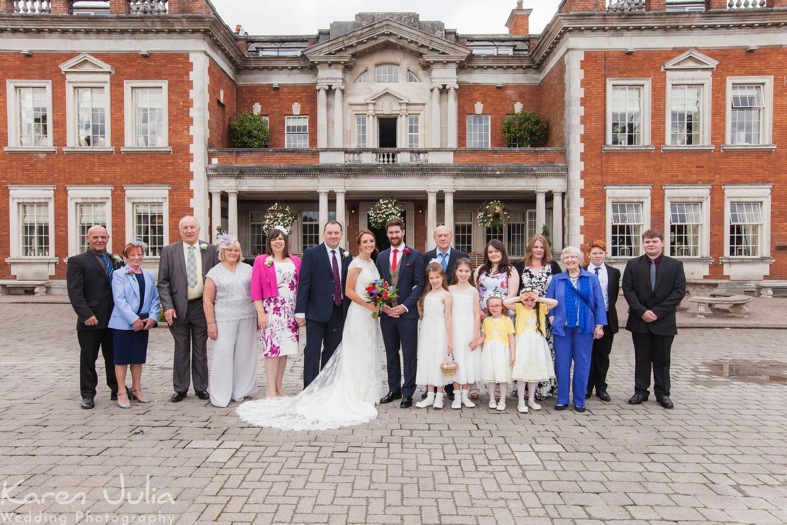 traditional family group photo at Eaves Hall wedding