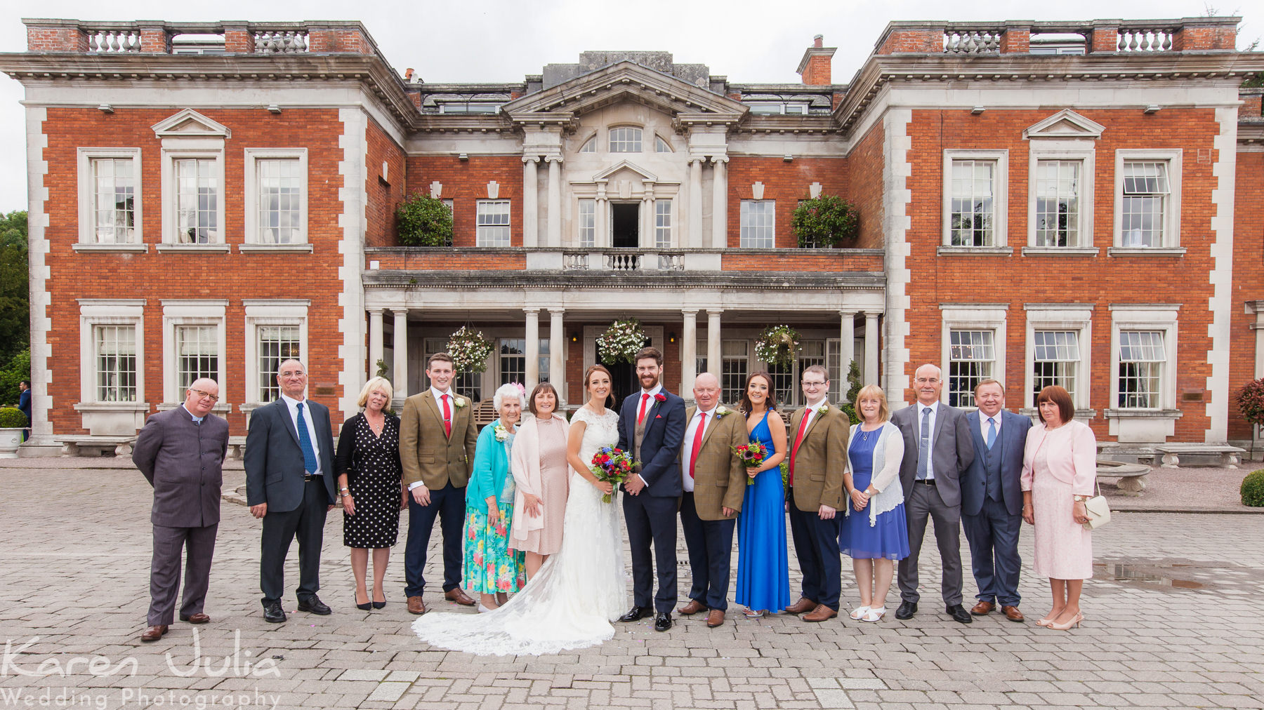 traditional style family wedding photo at Eaves Hall
