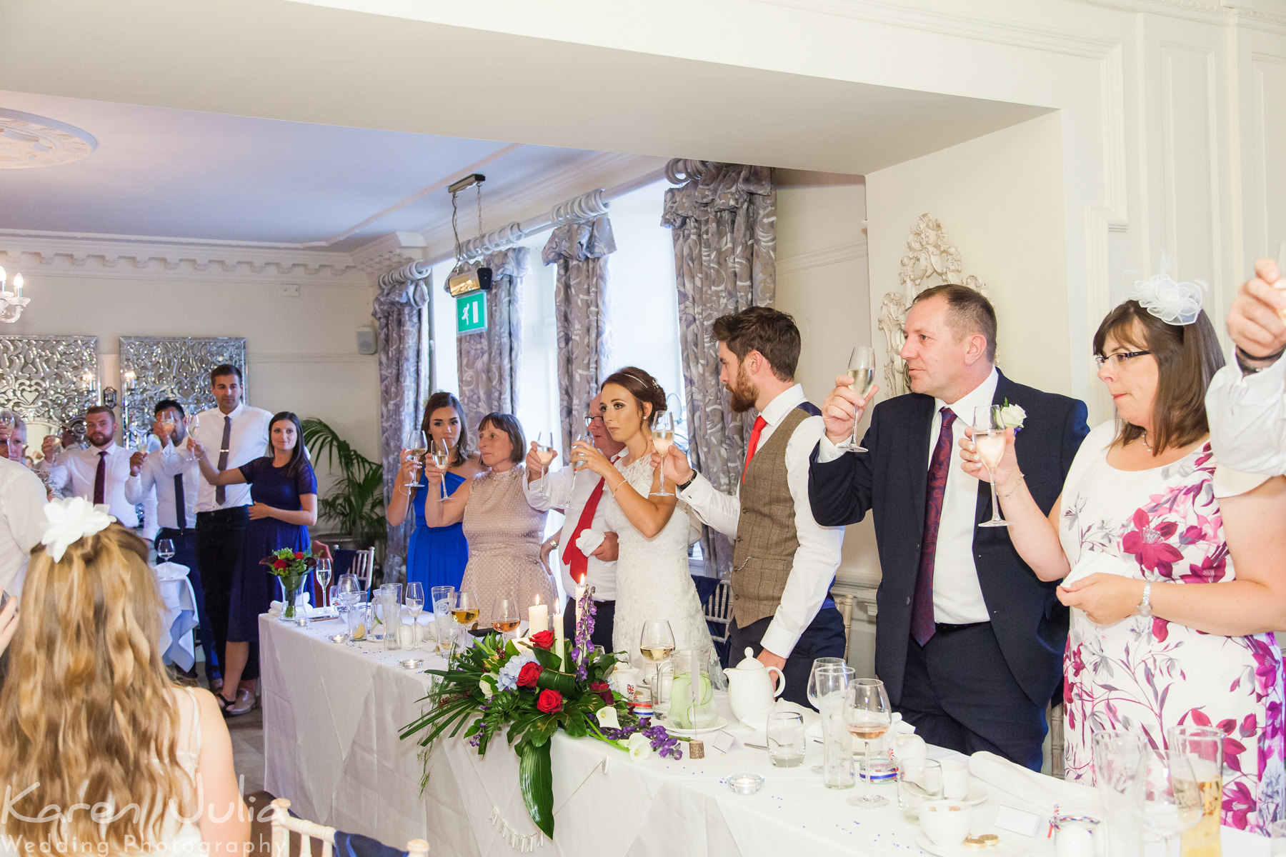 champagne toast during wedding speeches at Eaves Hall