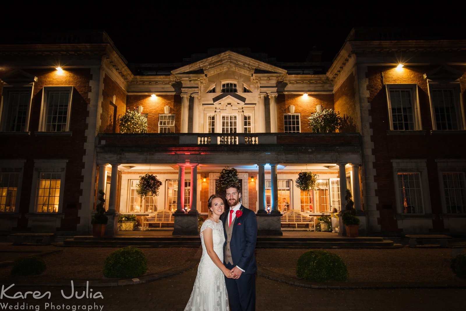 bride and groom portrait at night at Eaves Hall