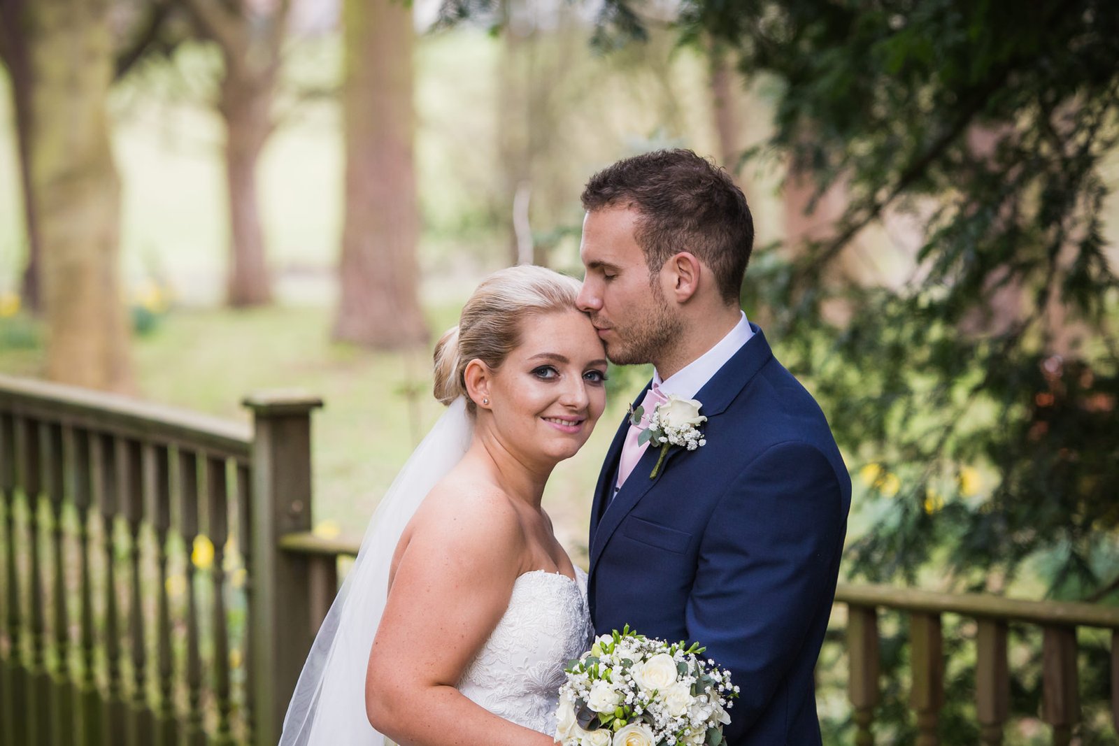 bride and groom portrait during their Classic & Elegant Deanwater Hotel Wedding