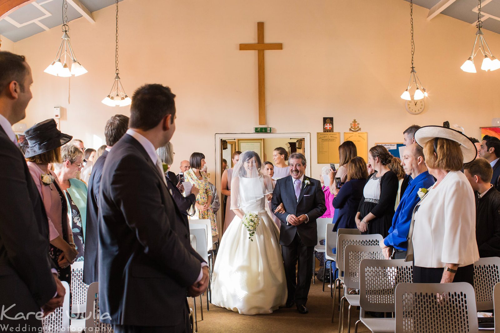 bride walks down the aisle at Cornerstone Methodist Church