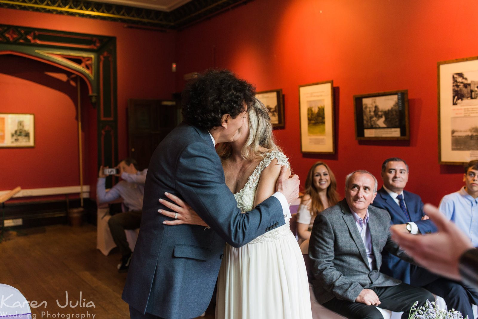 couple kiss at end of wedding ceremony in the old parsonage