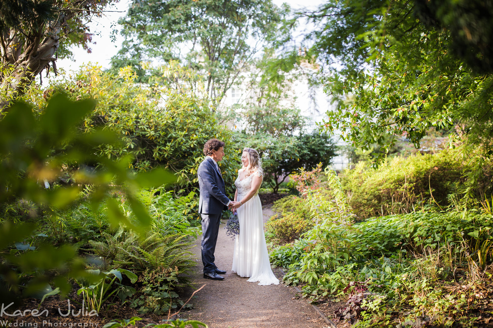 bride and groom portraits in Parsonage gardens on their wedding day