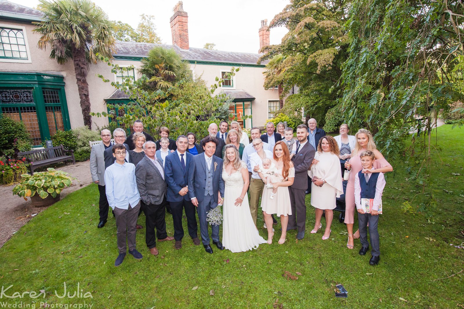 wedding group photo outside the old parsonage