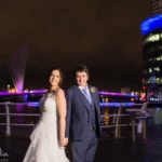 bride and groom portrait at night at their Lowry Theatre Winter Wedding