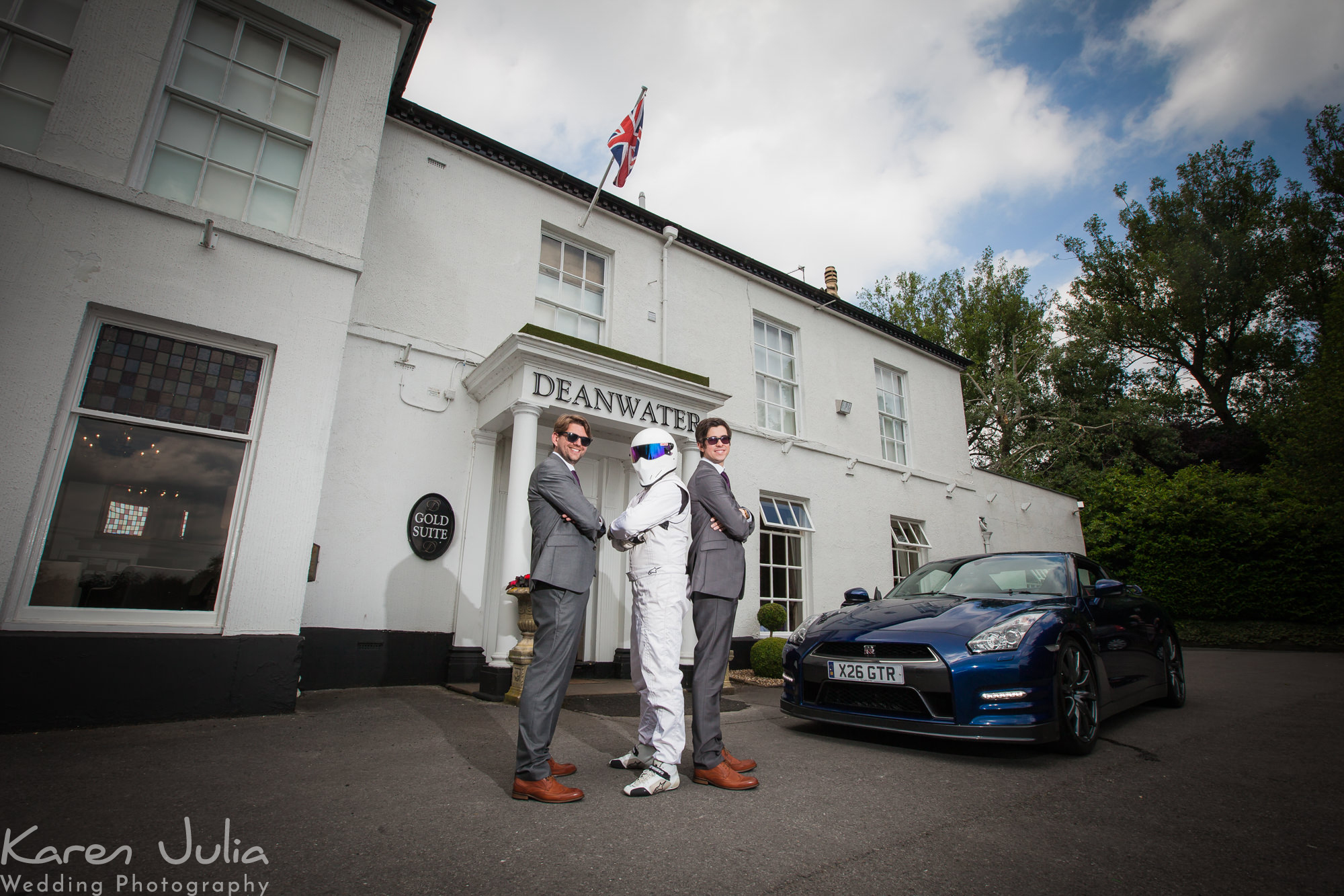 Groom with Stig-a-like GTR in front of the Deanwater Hotel