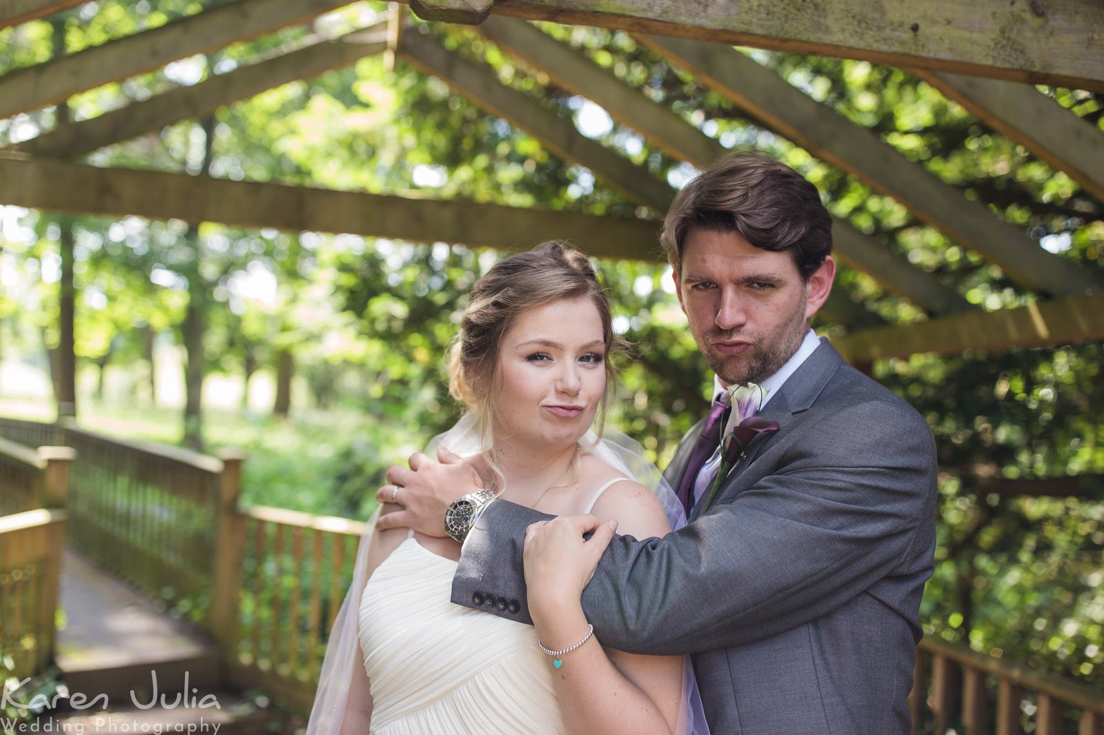 bride and groom wedding day portrait at the Deanwater Hotel, next to the river