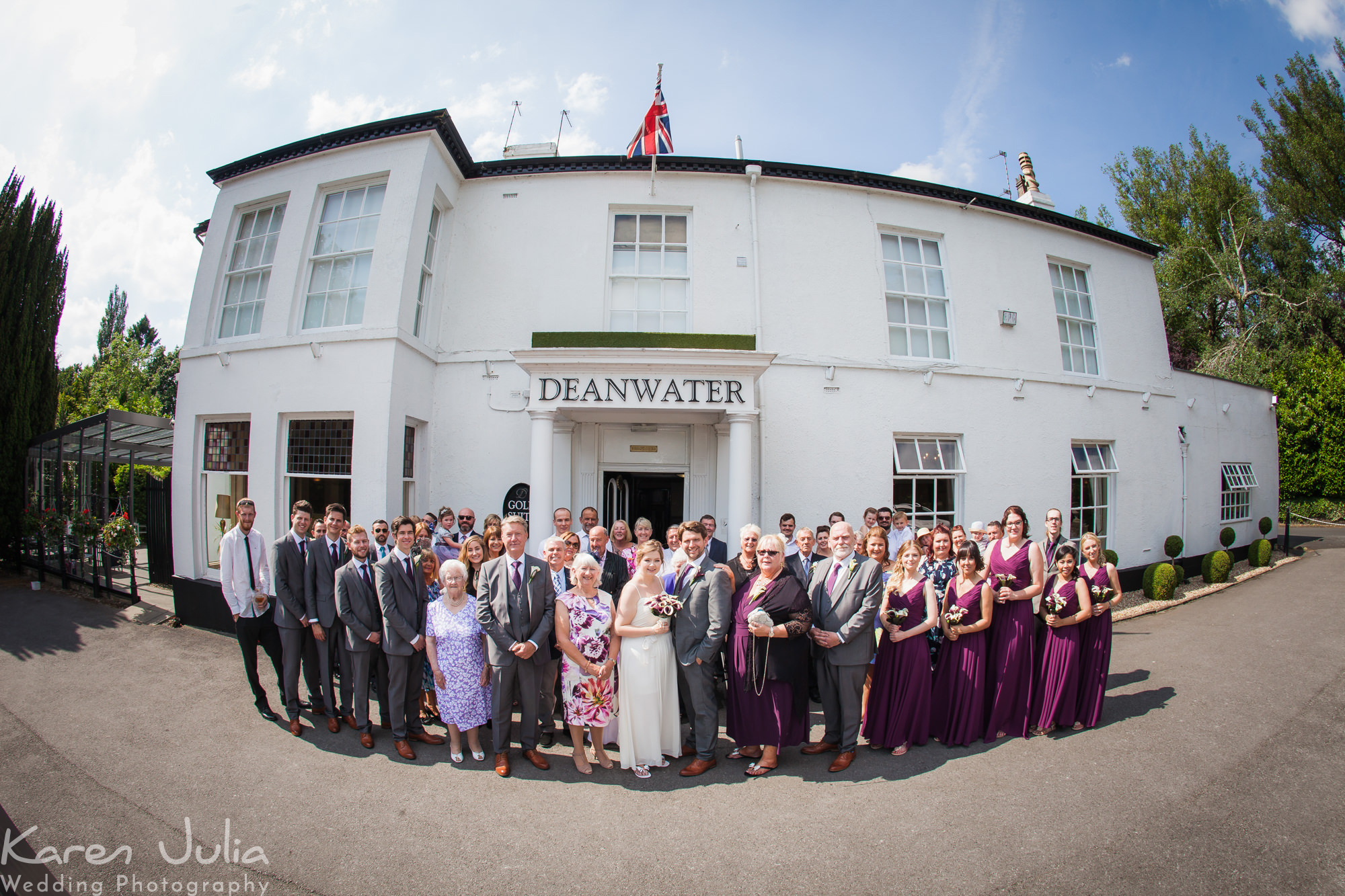 group photo of all guests outside the Deanwater Hotel