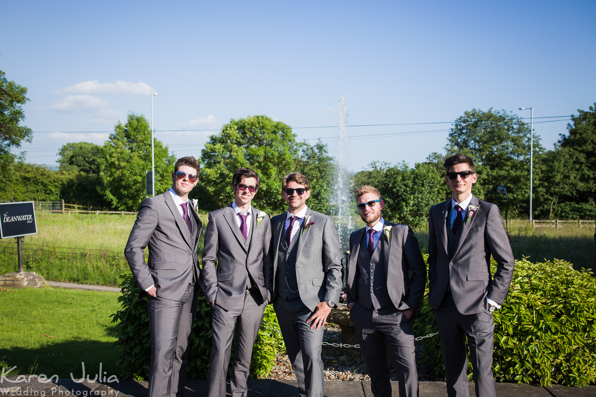 group photo of groomsmen and best men at the Deanwater Hotel