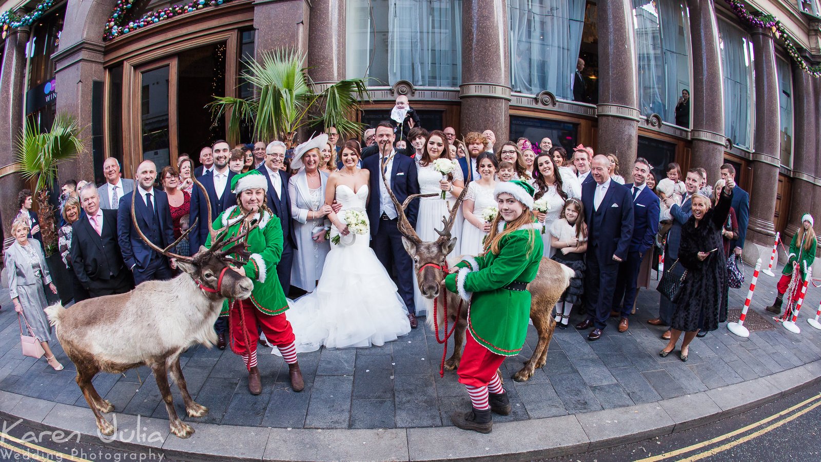 group photo outside the hard day's night hotel with reindeer