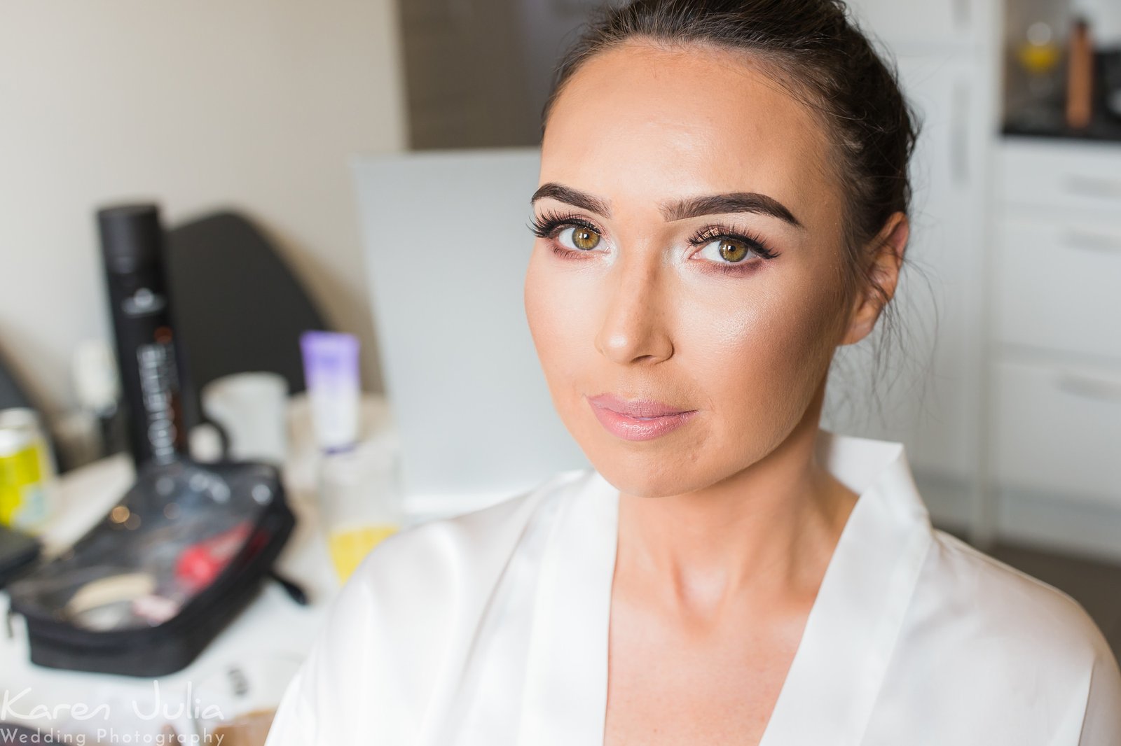 bride after makeup during bridal preparations in the morning