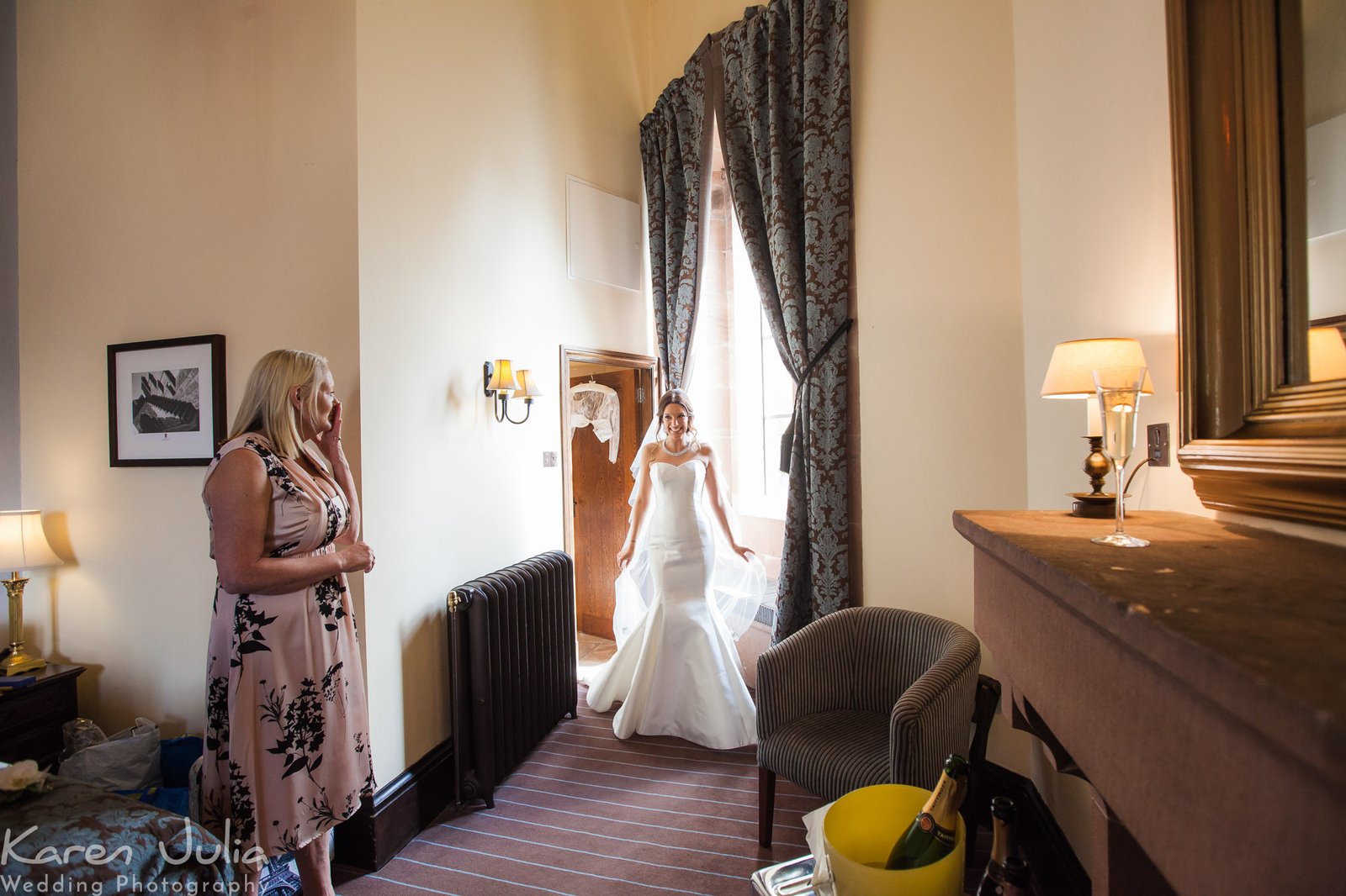 brides mum sees her daughter in her dress