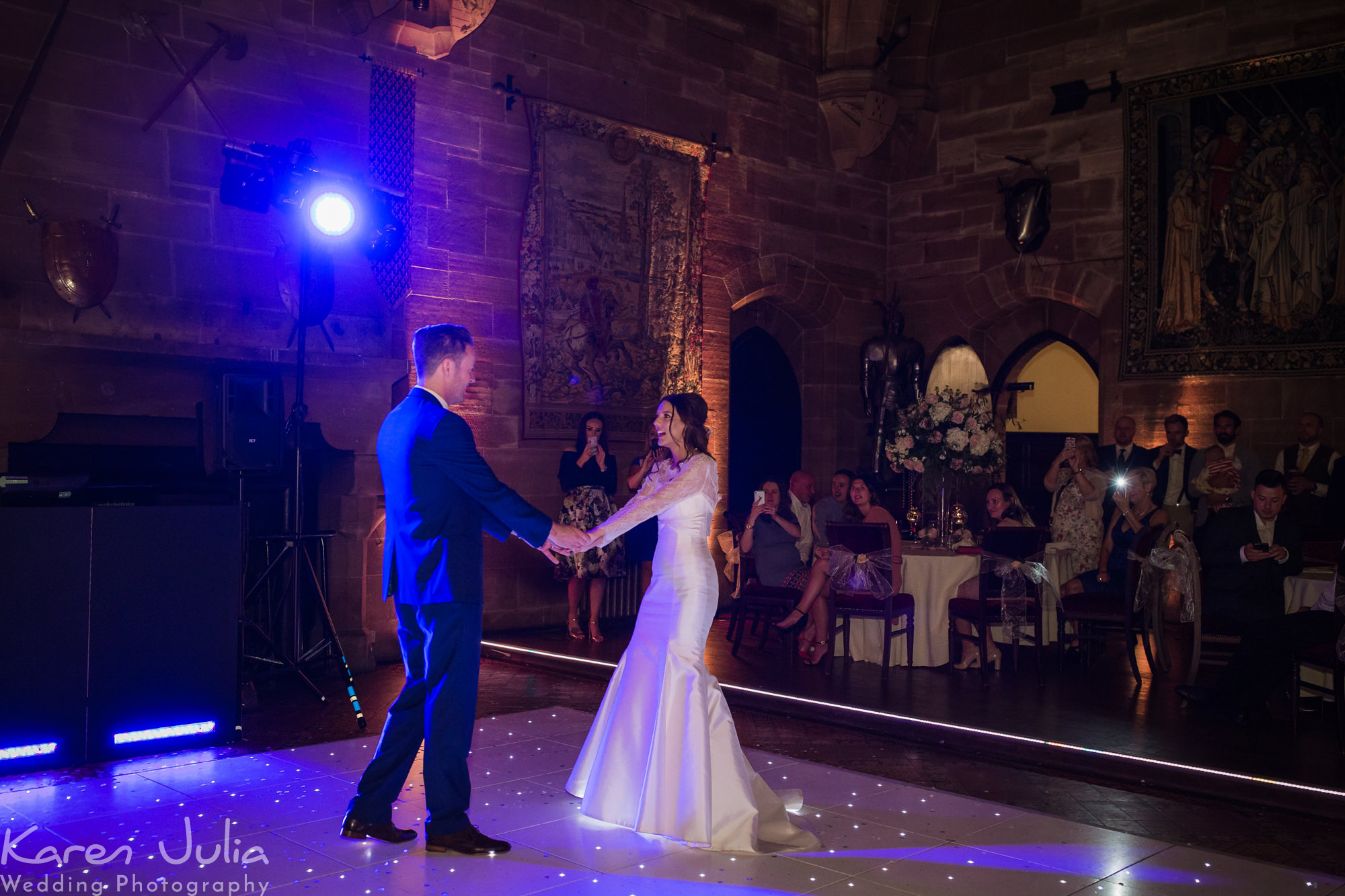 bride and groom first dance in Peckforton Castle