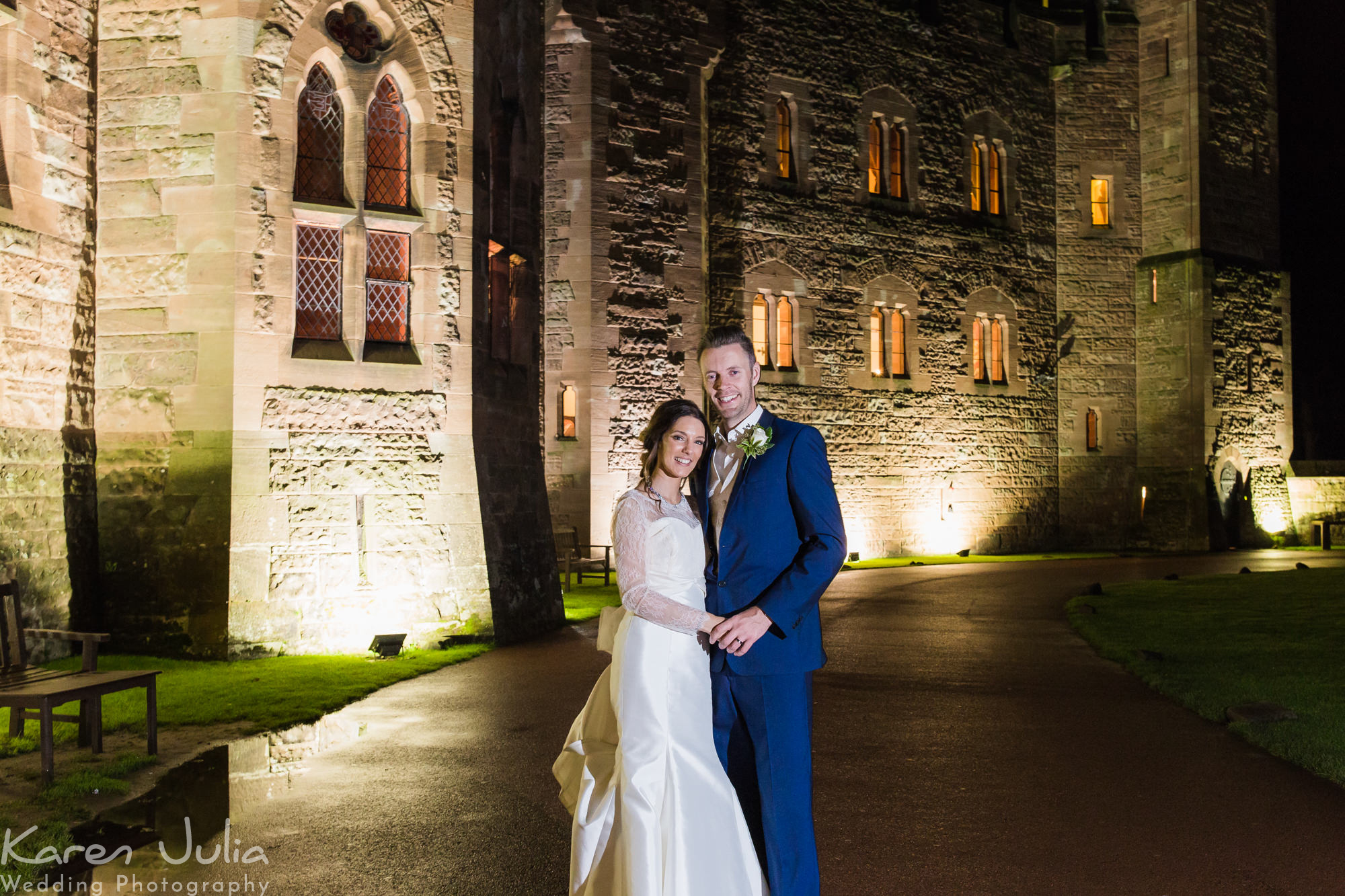 evening brie and groom portraits outside Peckforton Castle