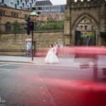 bride and groom portrait with traffic