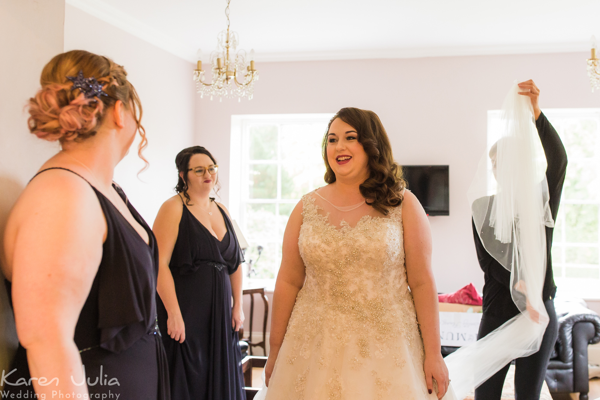 bride with bridesmaids before the wedding ceremony in Statham Lodge Hotel
