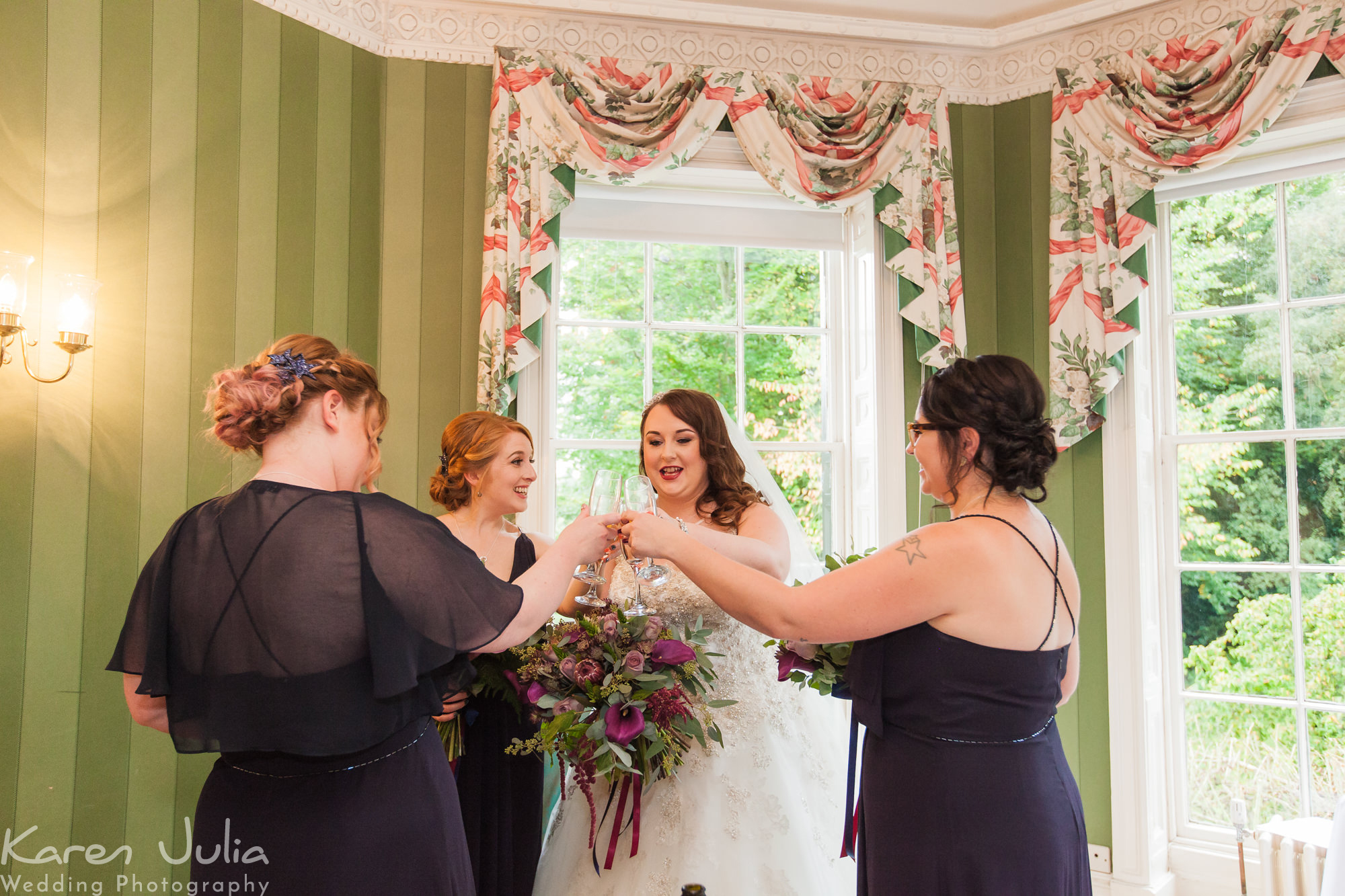 bride with bridesmaids before wedding ceremony at Statham Lodge hotel