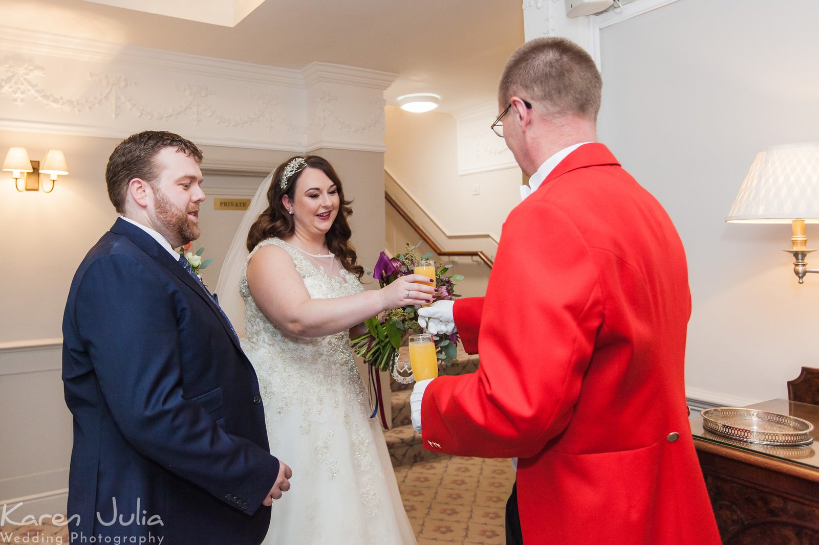 toatmaster Andy serves the happy couple drinks