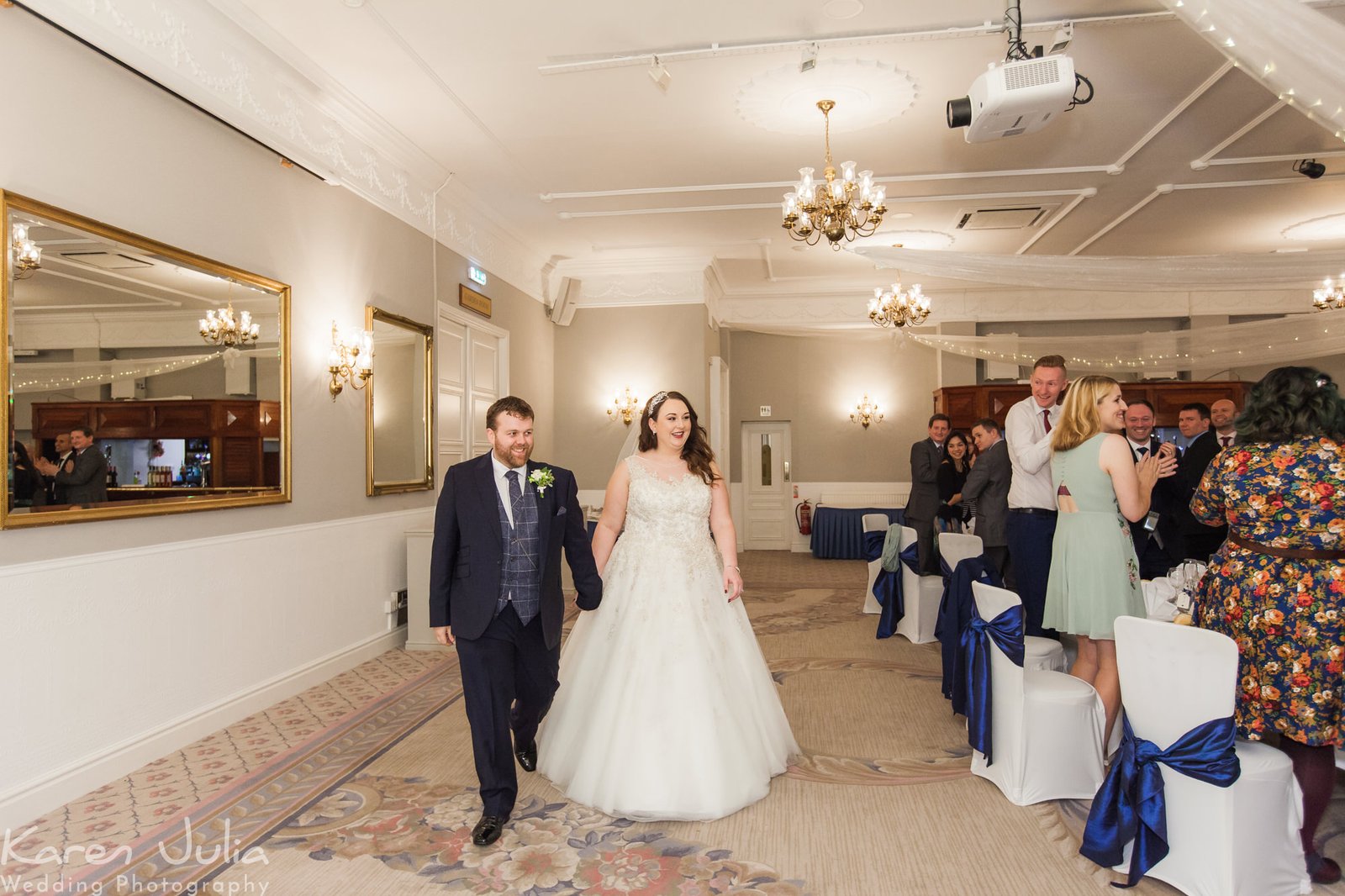 bride and groom arrive at wedding breakfast