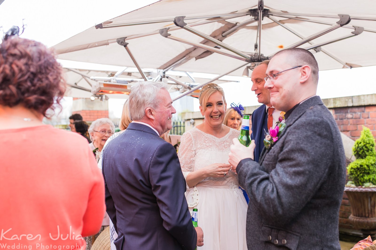 couple mingle with guests on the roof terrace