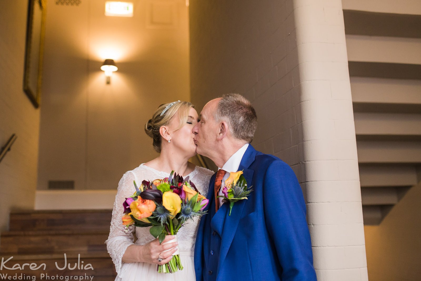 bride and groom portraits on the stairs at Great John Street Hotel