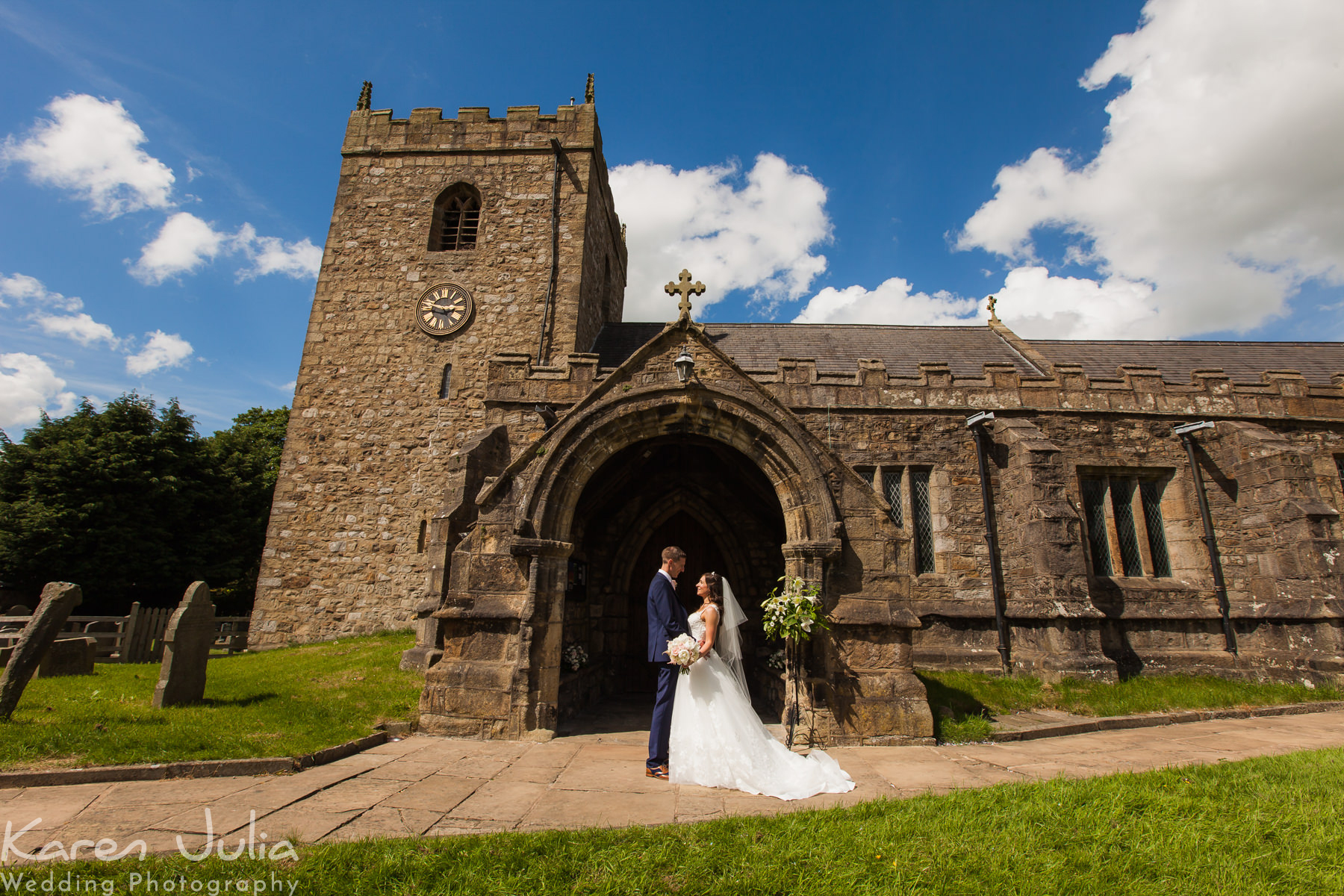 bride and groom portrait outside the church