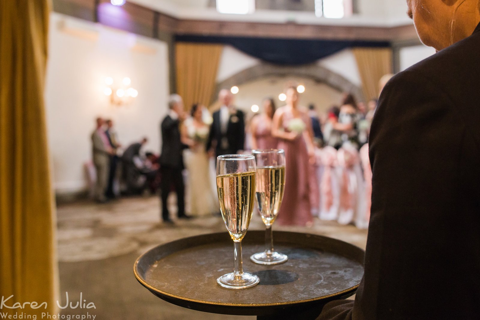 bride and groom leave ceremony heading to the drinks reception