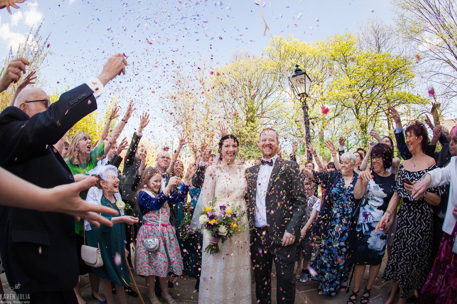 guests throw confetti at Ramsbottom Civic Hall