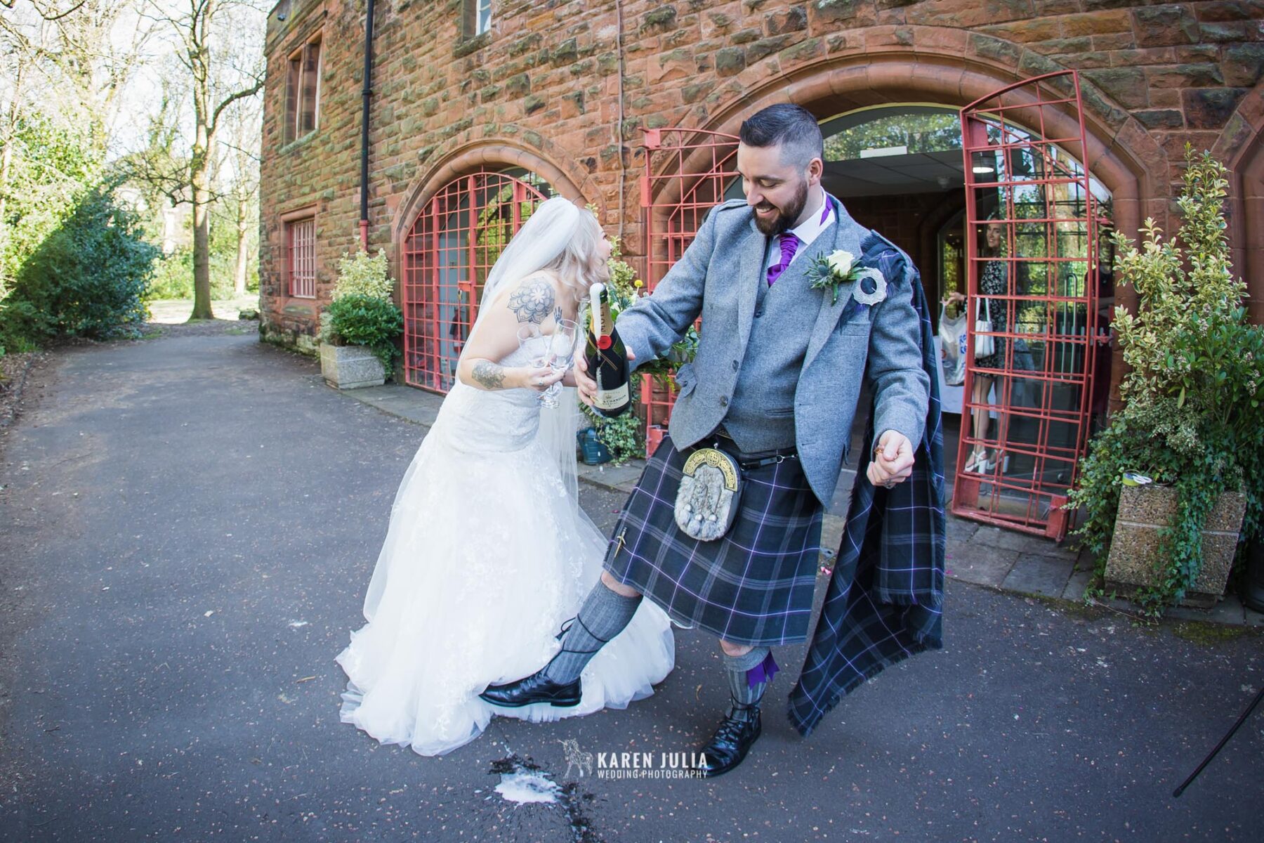 champagne goes everywhere, narrowly missing the brides dress, outside Pollockshields Burgh Hall