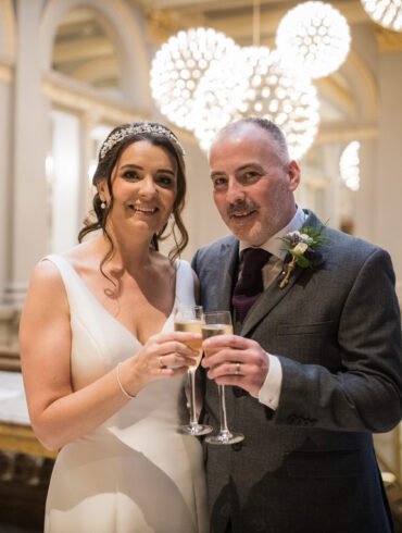 bride and groom on their wedding day in The Corinthian Club
