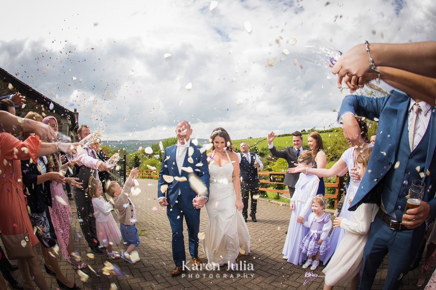 rose petal confetti at a summer wedding