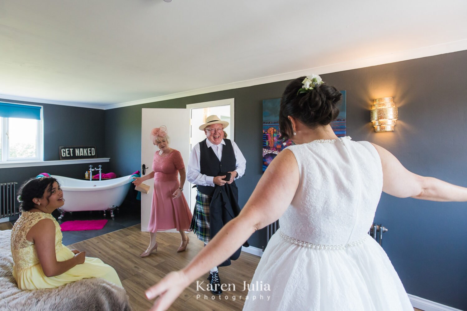 Dad walks into room seeing his daughter in her wedding dress