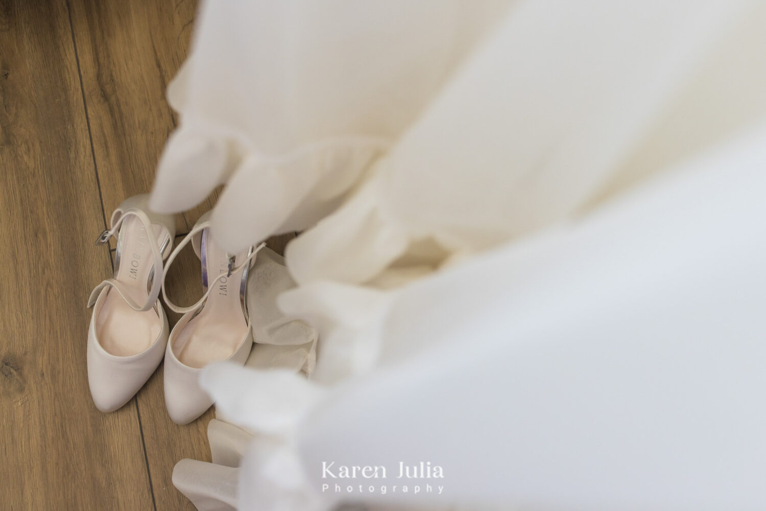 detail photo of wedding dress and shoes in Fruin Farm