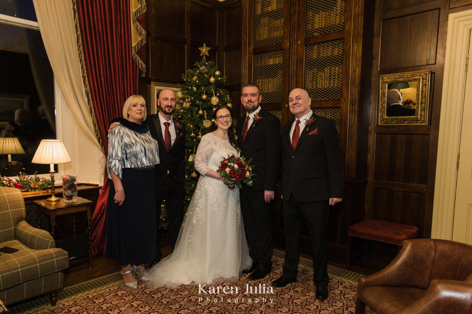 bride and groom wedding group photo with guests