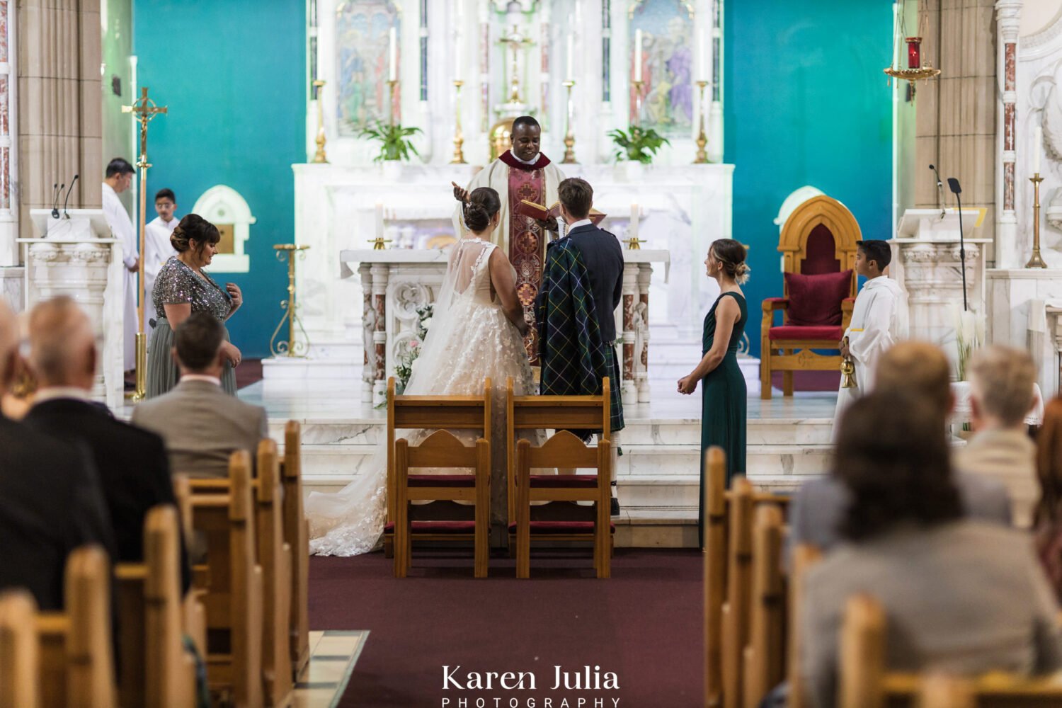 bride and groom exchanging vows during their wedding ceremony